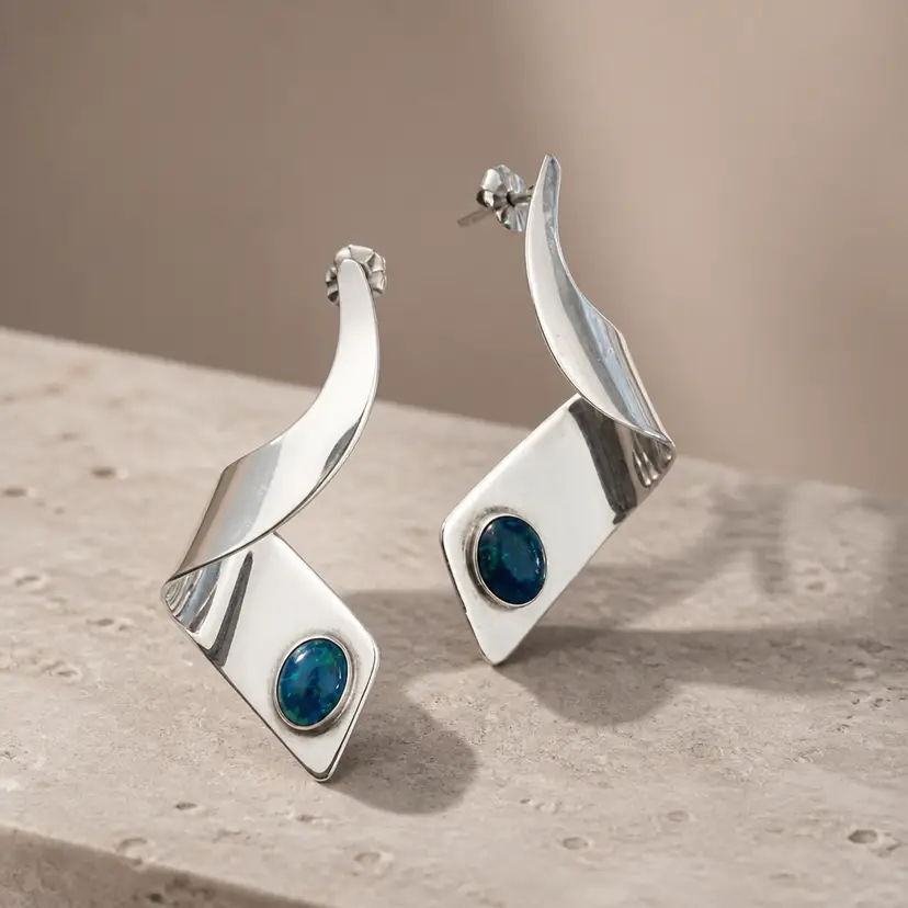 Sterling Silver Twisted Dangle Earrings w/ Bezel Set Oval Blue-Green Cabochon