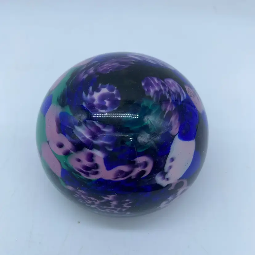 #0019 A multicolored studio art glass paperweight with internal blue and pink swirls Possibly Guernsey Glass