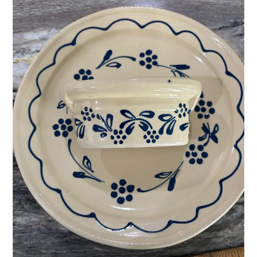 Vintage European folk art style earthenware plate and small baking dish, most likely produced between 1970 and 1990.