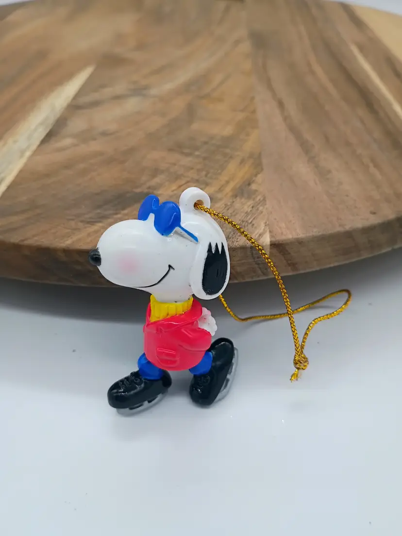 Peanuts USA Snoopy Joe Cool Ice Skating PVC Christmas Ornament .
