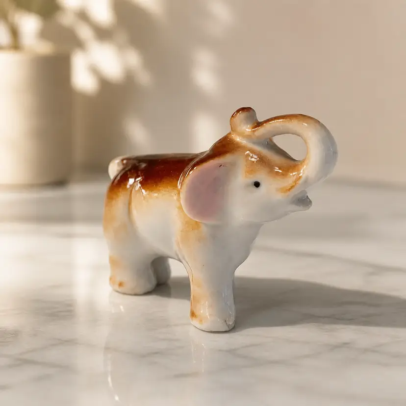 Vtg Glazed Porcelain Elephant Figurine w/ Raised Trunk, Made in Japan, 2.5"