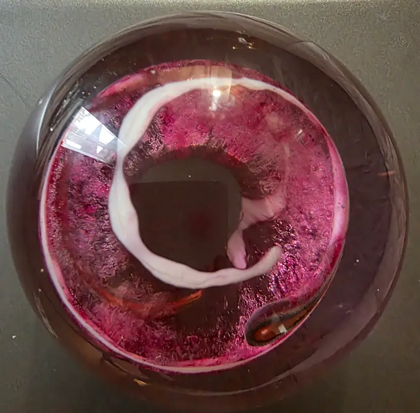 Pink Paperweight with Orange 'Tadpole'
