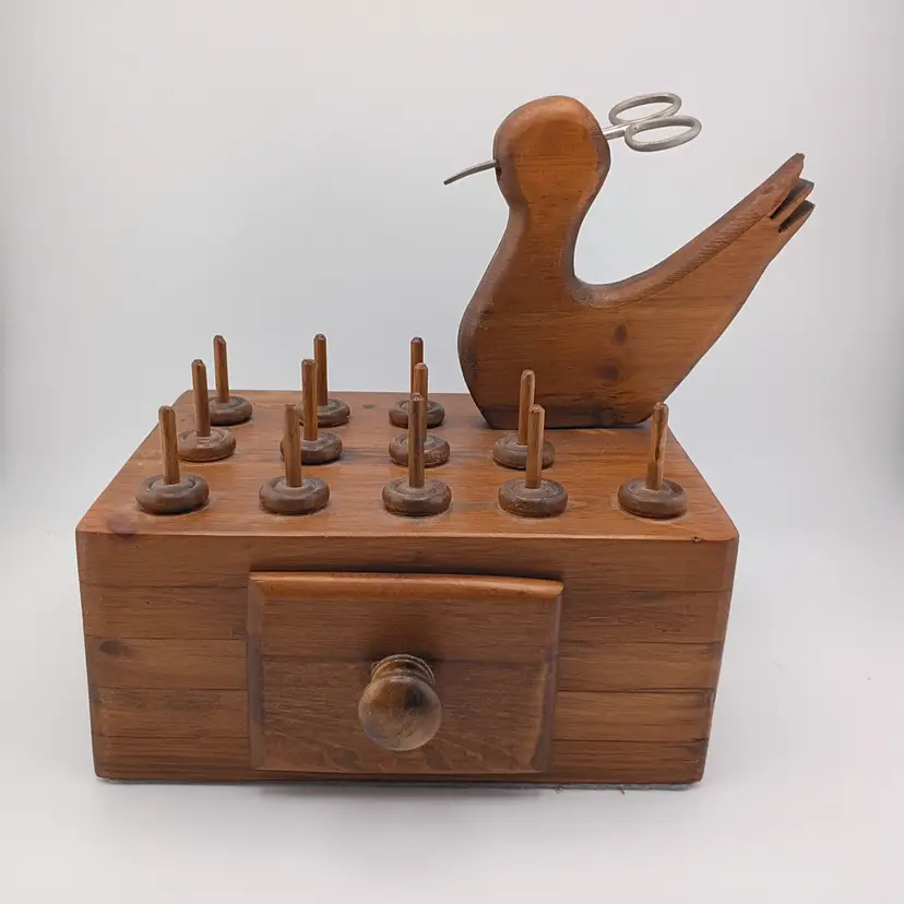Wooden sewing caddy with bird