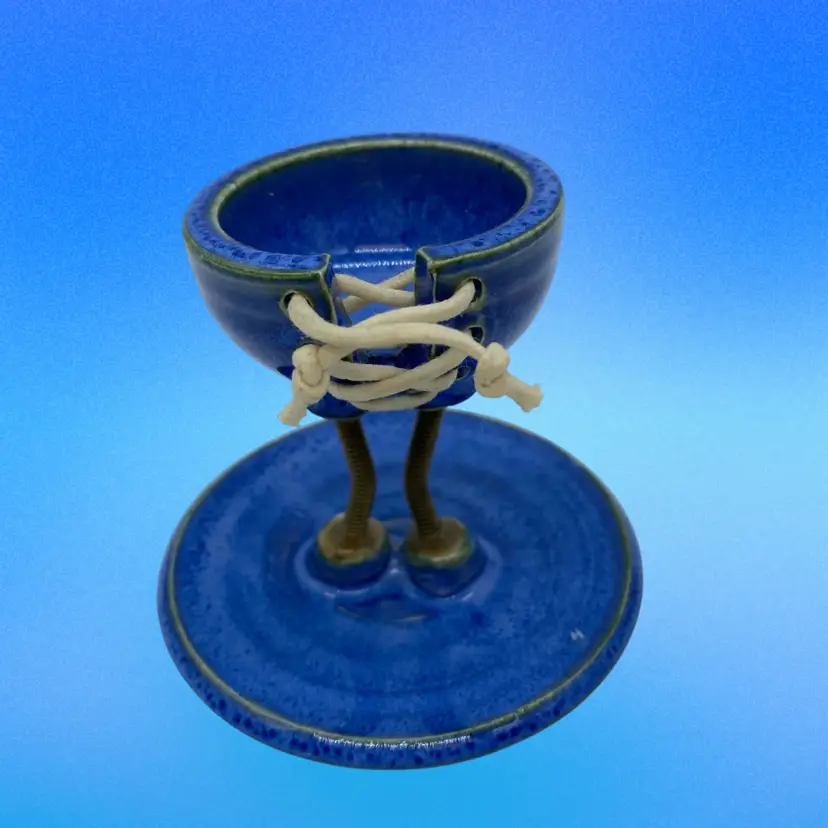 #4825 Handmade blue ceramic egg cup signed by the artist.