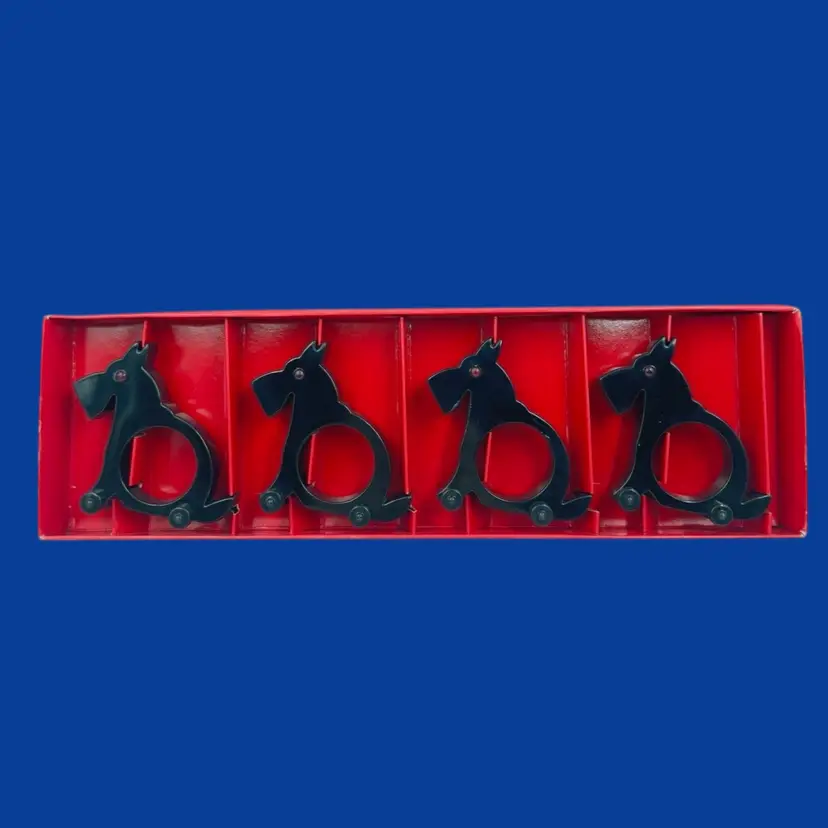 #034- 4pc Napkin Ring Set On Wheels! By Restoration Hardware