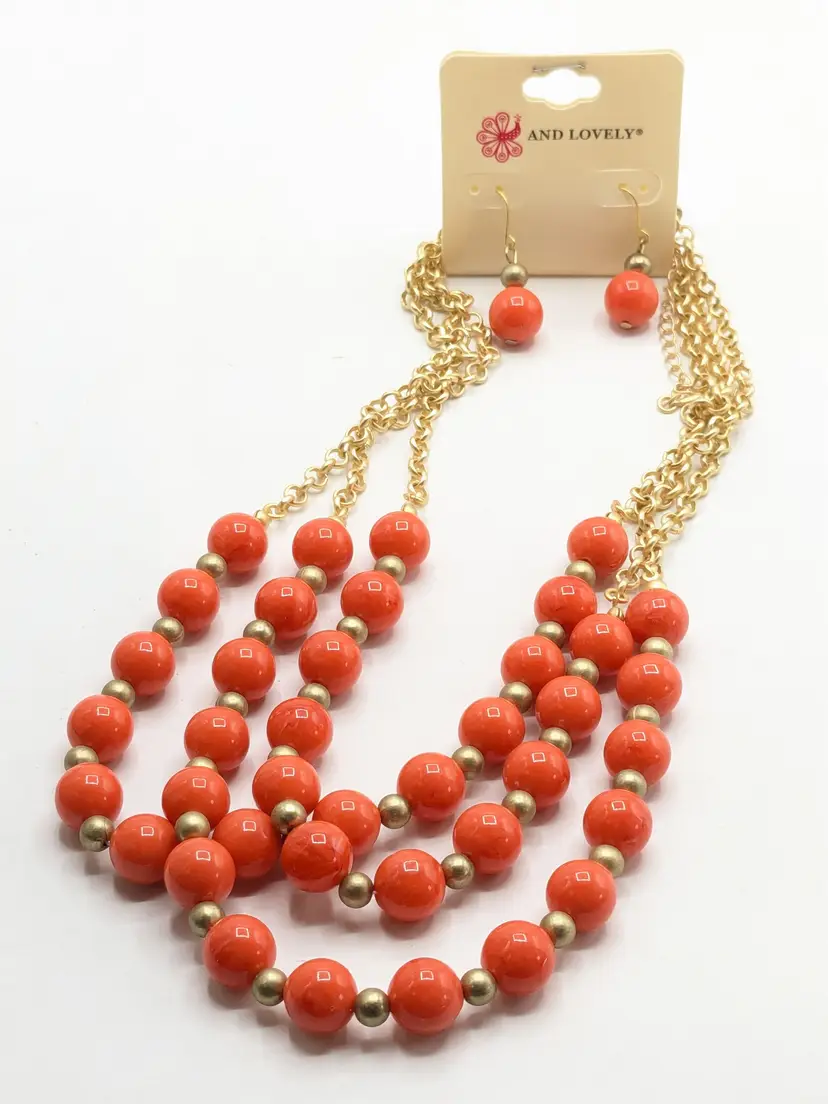 And Lovely Gold Tone Multi-Strand Orange Bead Necklace and Earring Set NWT