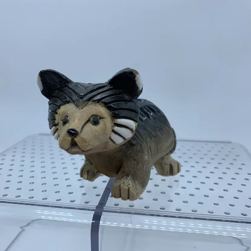 #3017 Hand-carved ceramic figurine of a wolf pup by Artesania Rinconada.