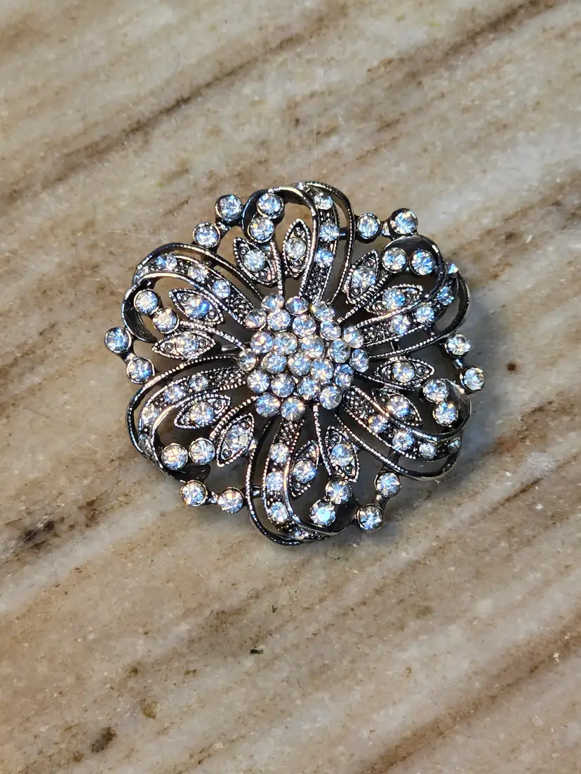 #21 Silver Tone Clear Rhinestone Floral Starburst Brooch