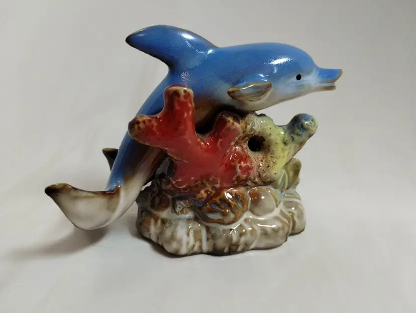 Two Graceful Swimming Over a Reef Dolphins Ceramic Figurine