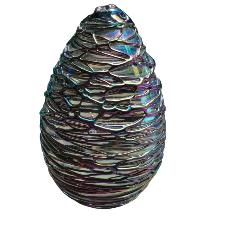 This item is a vintage Glass Eye Studio (GES) Iridescent Threaded / Dichroic Egg Paperweight made of handblown art glass