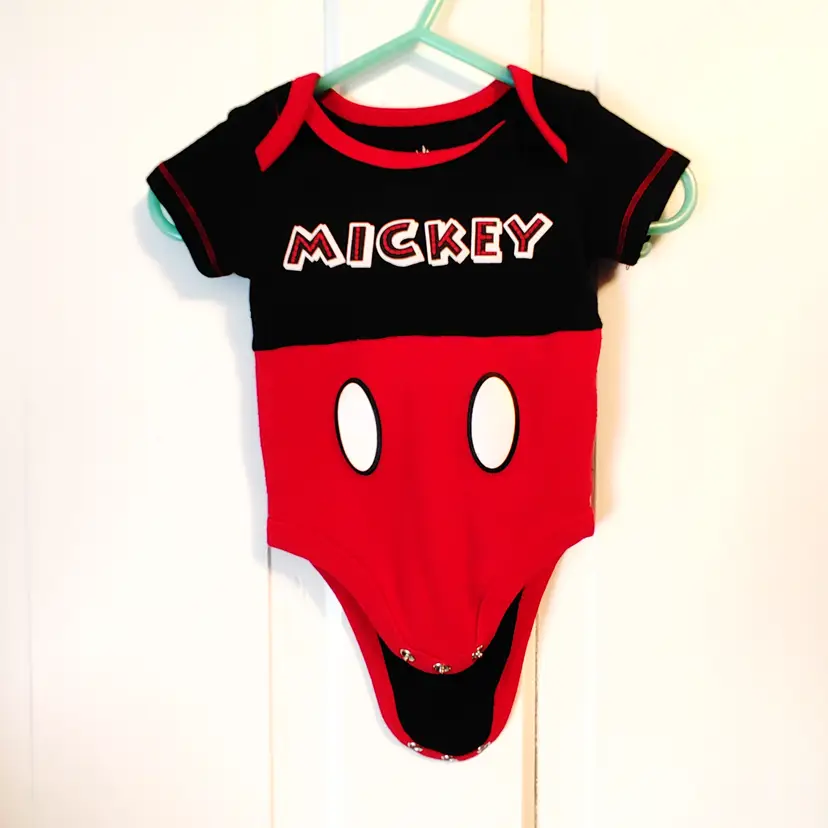 Kids- Brand: Disney Baby. Size Newborn. Onesie. Material- 60% cotton, 40% polyester. No callouts.