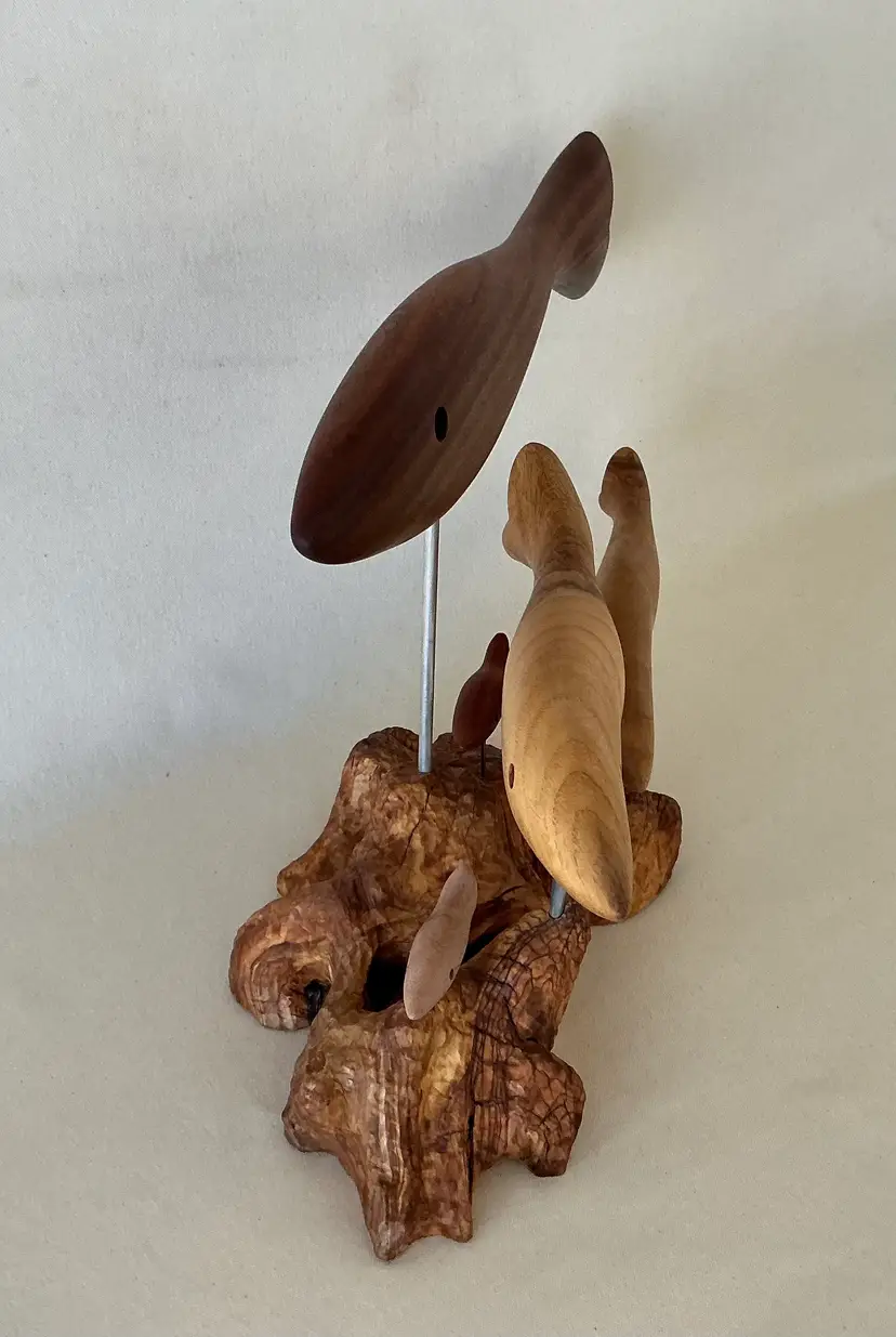 “Pisces” Sapele, Az ash, Purple Heart & Carob wood fish. Olive wood base. 19”w x14”h x10”d. 7 day return policy (Buyer pays return shipping and must be safely packaged)