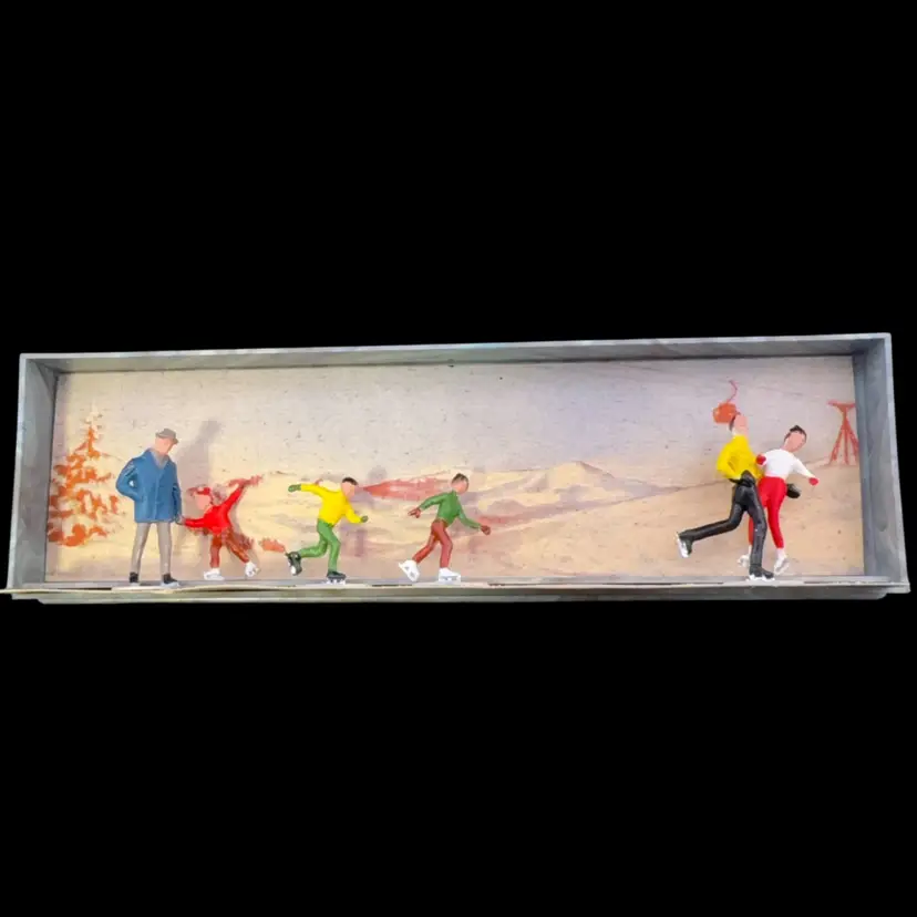 Minature Merten Ice Skaters In Box 1” x .5”