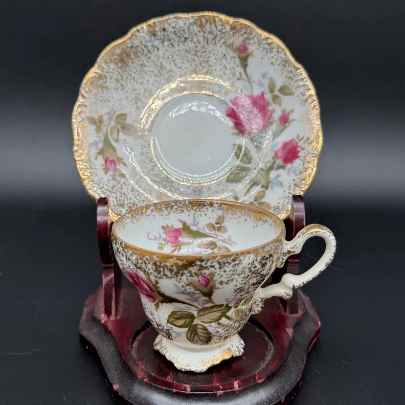 Unmarked Roses Gold Gilded Footed Teacup And Saucer