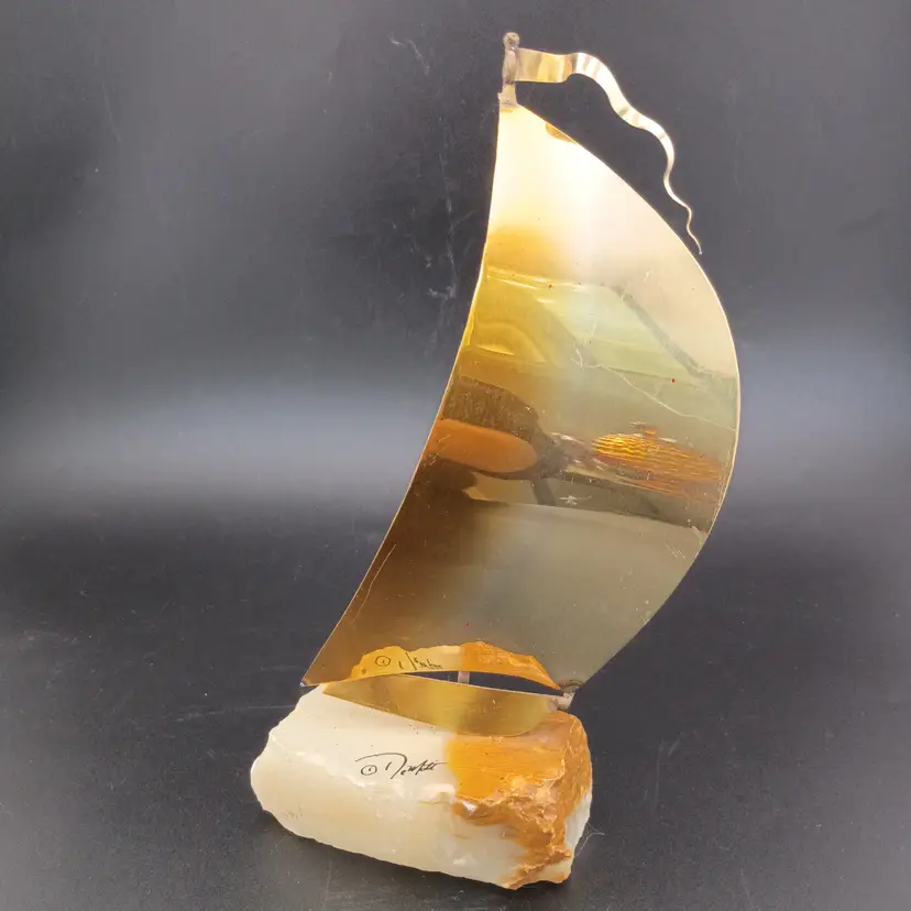 Signed DeMott metal and stone sailboat sculpture