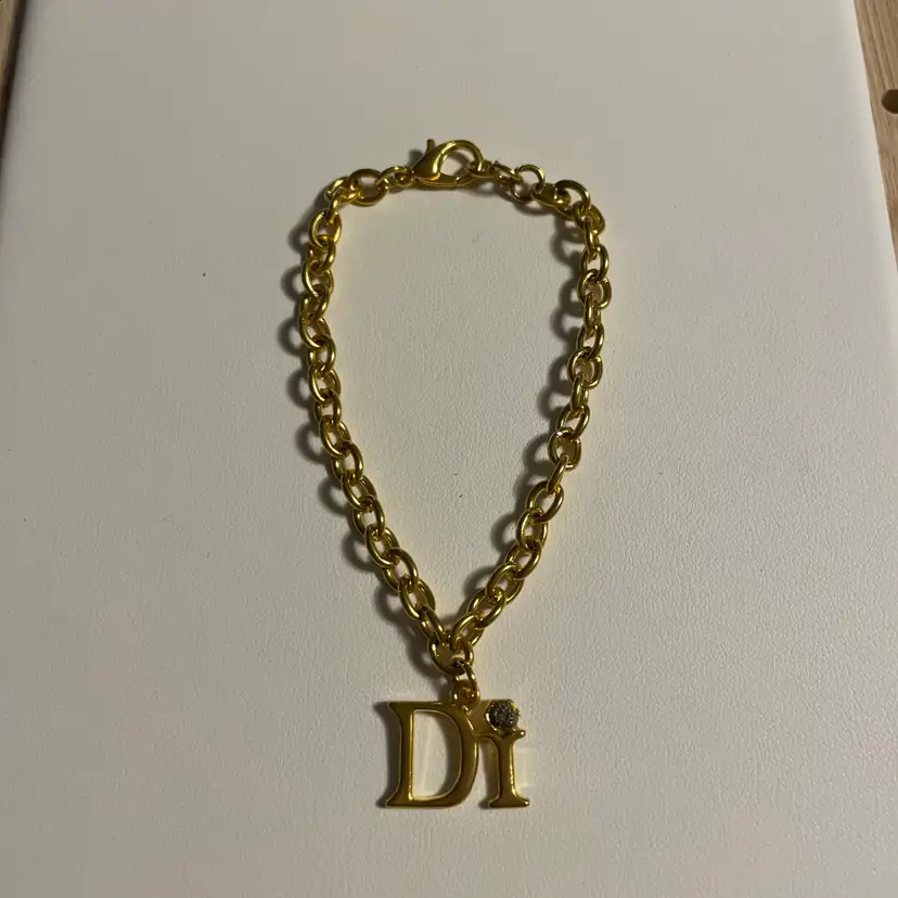 31 Goldtone Chain Bracelet with “Di” Initial Charm