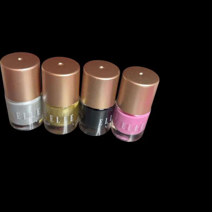 Four Mini Elle Nail Polishes, Assorted Colors, Silver, Gold, Black, And Pink