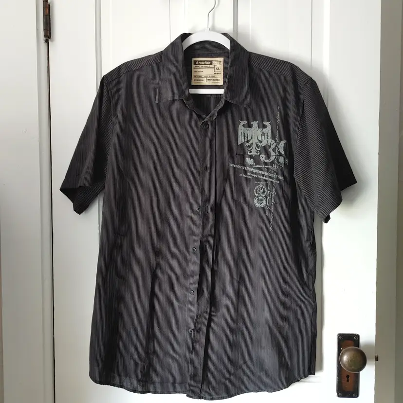 Men's Top- Brand: Niachine. Size XL. Black top. Material: 100% cotton. No condition issues.