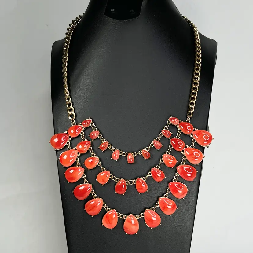 22” Triple Strand Tangerine Melon Colored Acrylic Bead Necklace. Gold-tone Chain. 3” Extender. Unsigned.
