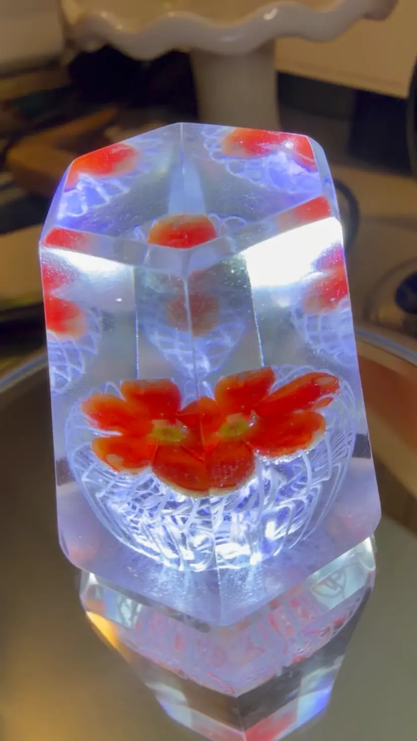 #16…..Mini Hexagonal Glass Paperweight with Red-Orange Flower – 1¾″ Tall