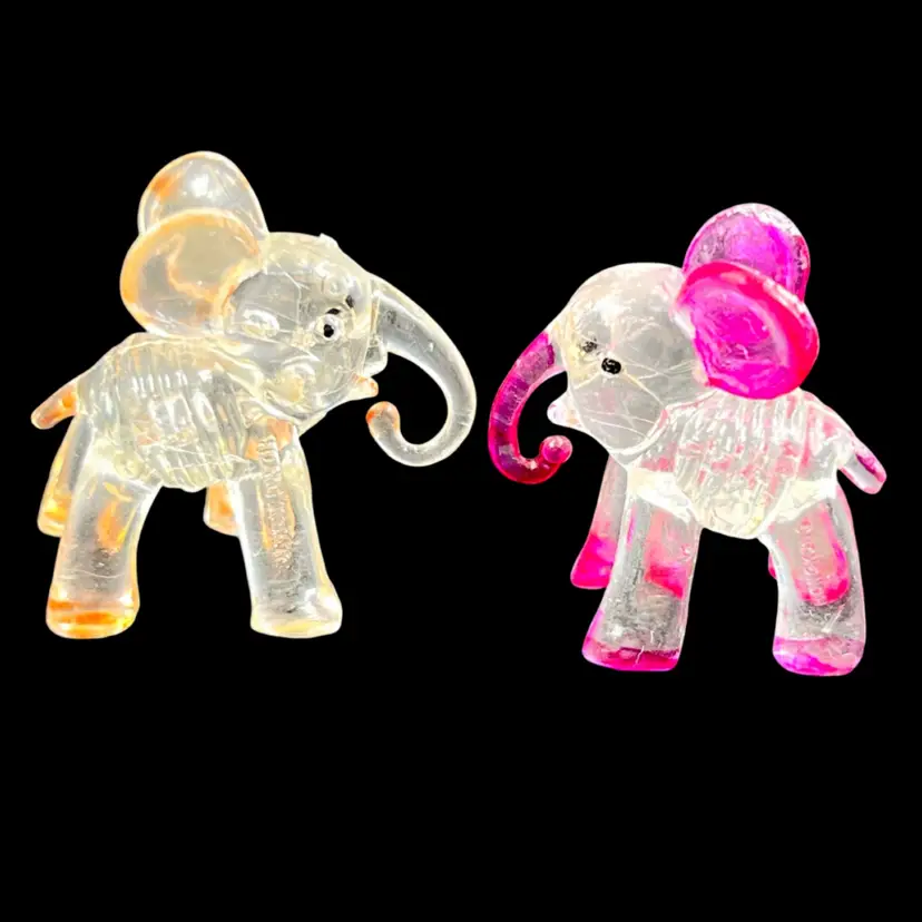 Miniature 1-3/8” Elephants Plastic Figurines. Orange 🐘; Pink 🐘. Stamped “Hong Kong”. Vintage Knick-Knack Trinket Tchotchke.