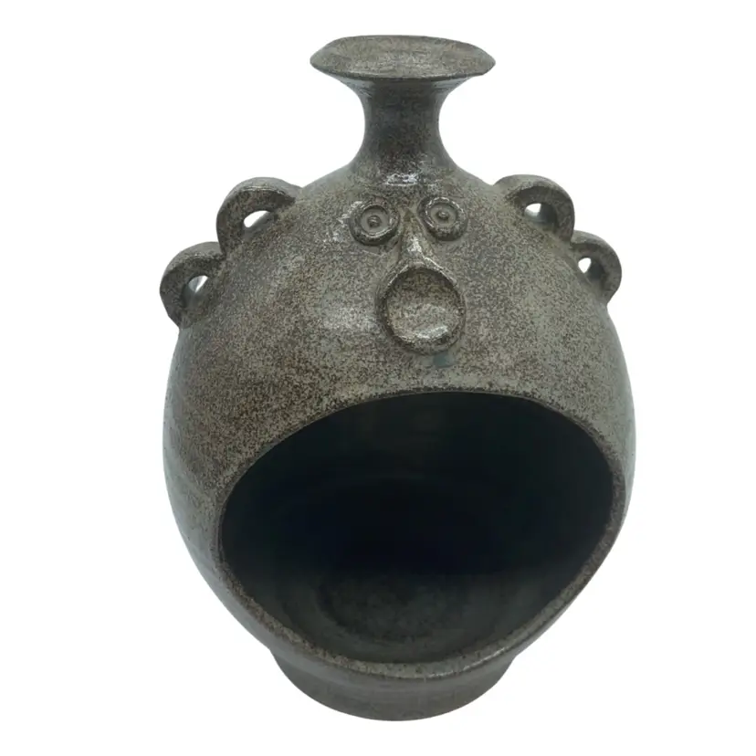 #2216 Signed speckled grey stoneware pottery vessel with an expressive applied face.