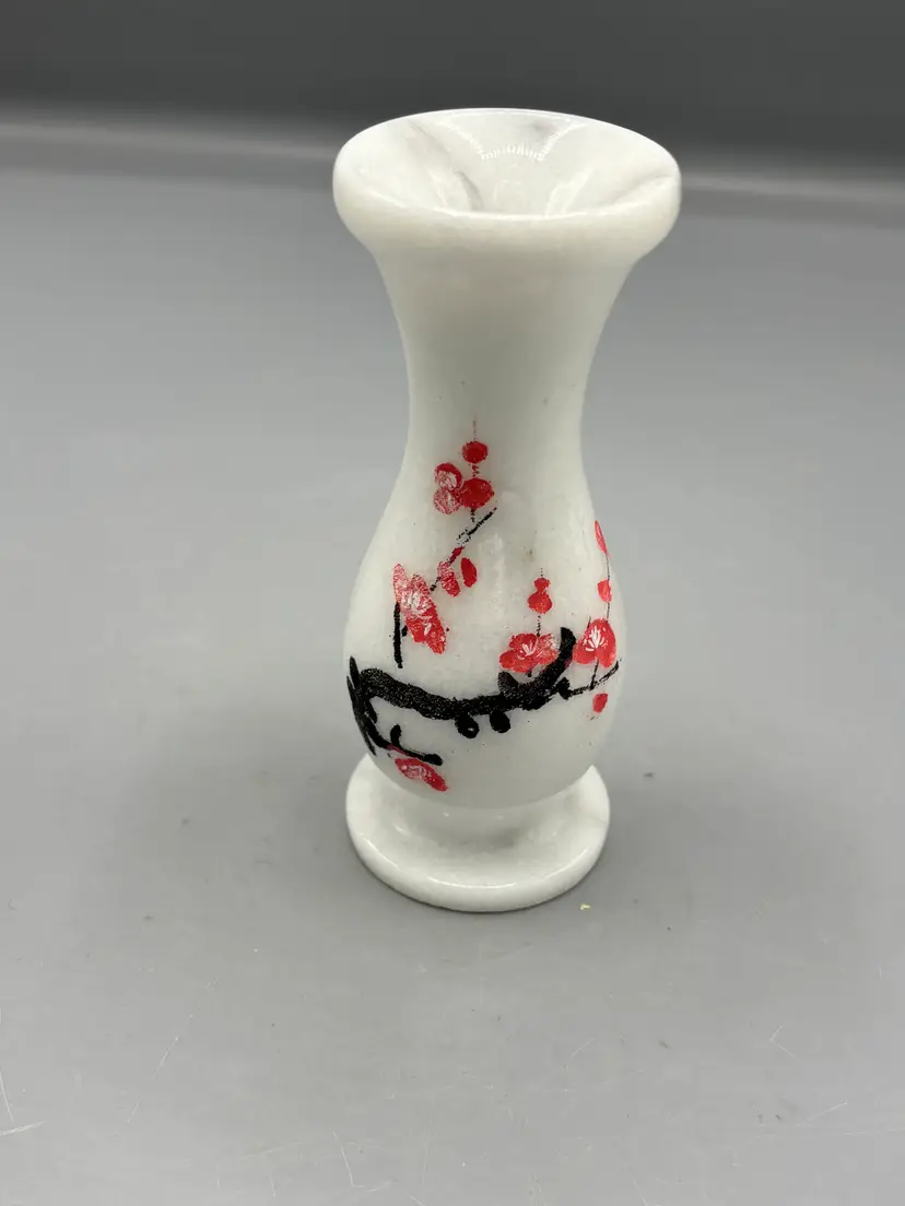 White marble vase with Cherry Blossom branch