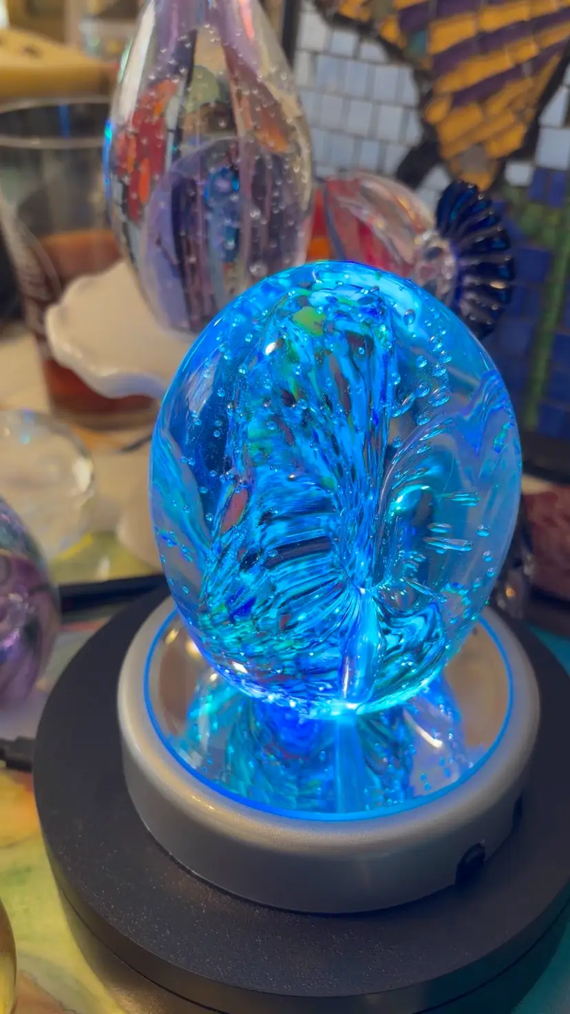 #2…..Colorful glass pen holder paperweight, holds three pens, 4 inches tall.”