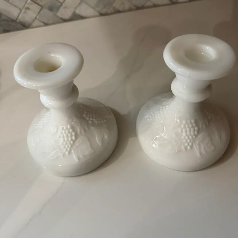 Vintage pair of Westmoreland milk glass grape and leaf pattern candlestick holders.