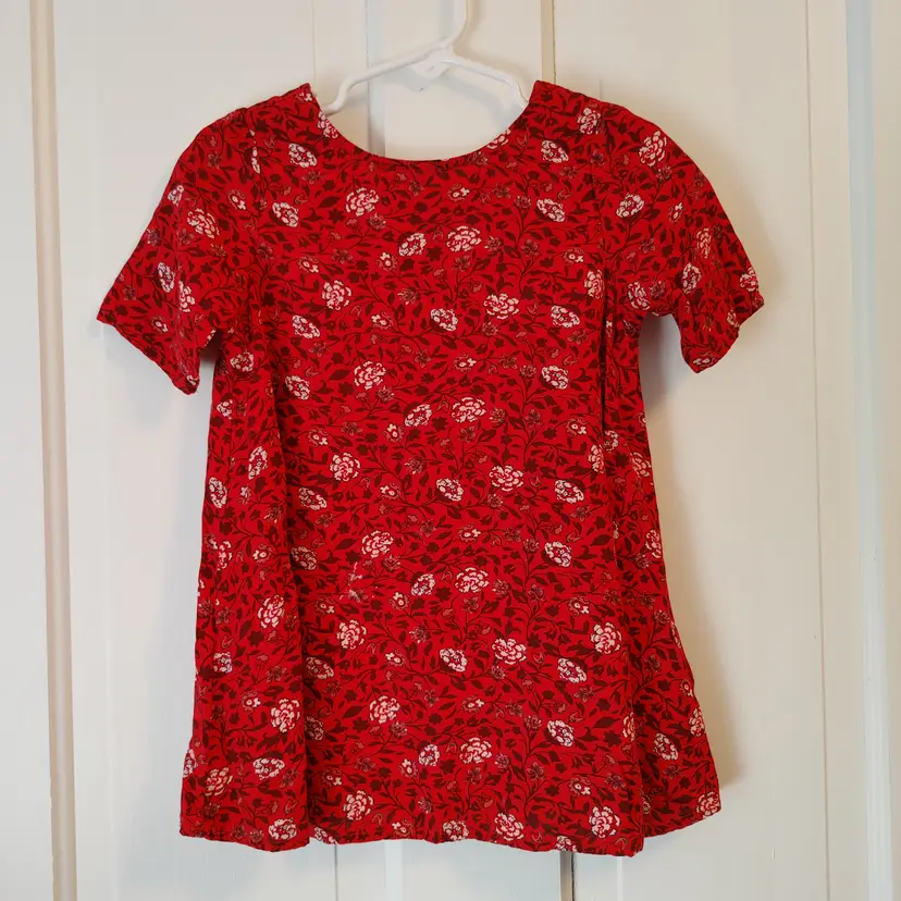 Kids- Brand: Old Navy. Size 2T. Red dress with pink flowers. 1 spot on dress. See pic. Material: 100% rayon.
